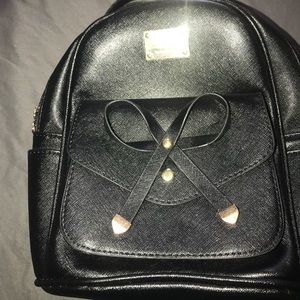 Mini black backpack New Never Used Without Tags